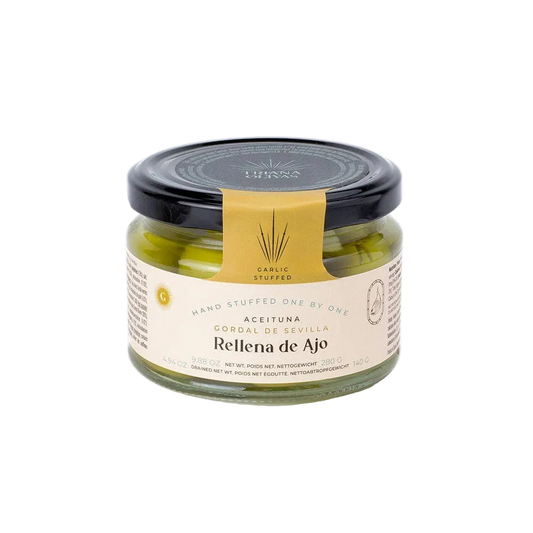 Triana Olivas. Gordal Olives from Seville stuffed w/ Garlic.